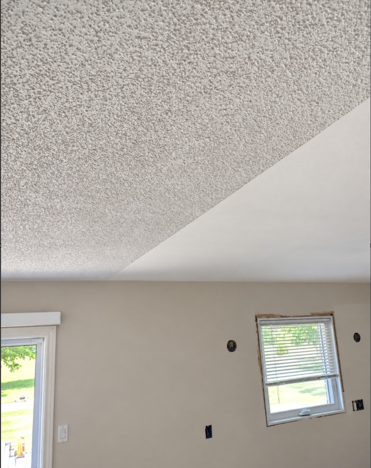 Popcorn ceiling removal in progress, showing textured and smooth sections